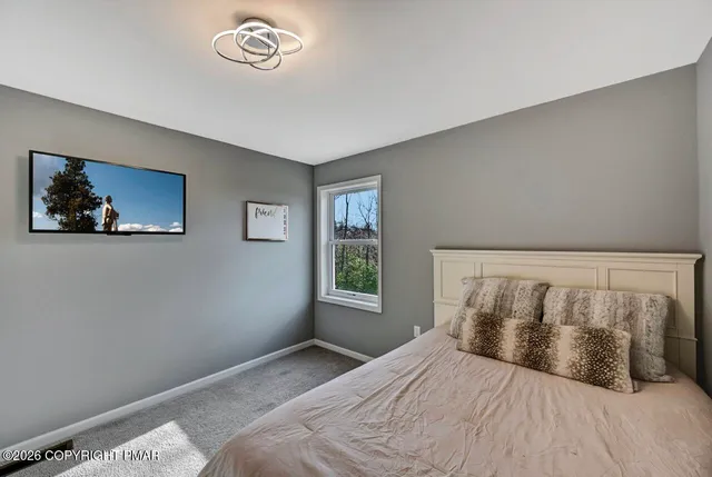 a bathroom with a sink a toilet and a bathtub