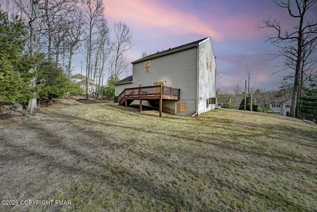 1013 Bear Swamp Road East Stroudsburg, PA 18302 - Photo 52 of 53 a view of a house with a yard