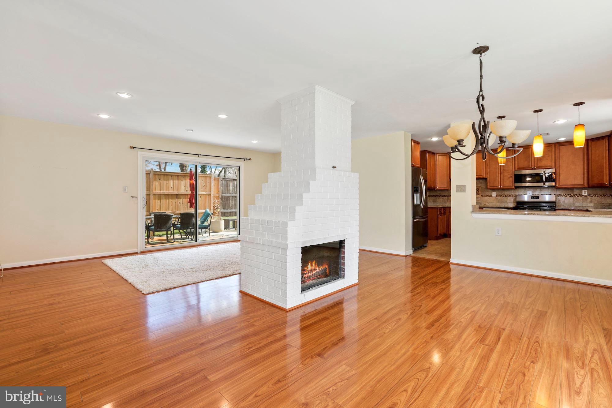 5200 Garner Street Springfield, VA 22151 - Photo 7 of 38 Wide open design w/Double sided fireplace