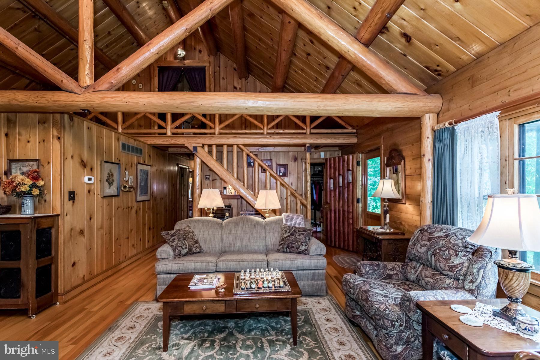 9732 Whiskey Bottom Road Laurel, MD 20723 - Photo 4 of 63 Living room with exposed beams
