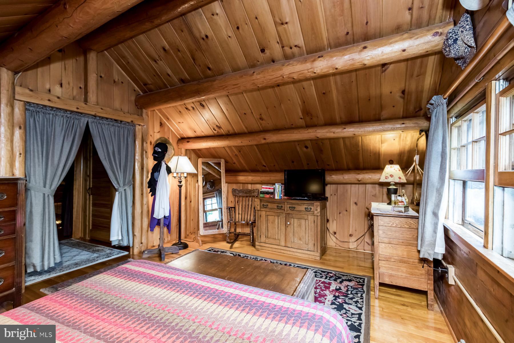 9732 Whiskey Bottom Road Laurel, MD 20723 - Photo 45 of 63 Owners' room w/his & hers WIC behind curtain