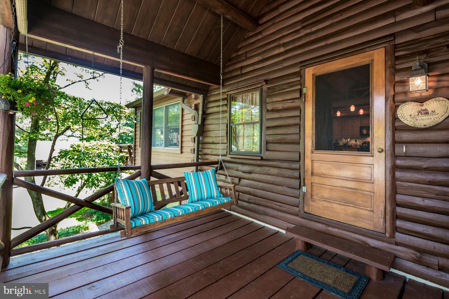 9732 Whiskey Bottom Road Laurel, MD 20723 - Photo 59 of 63 Porch comes complete with porc swing