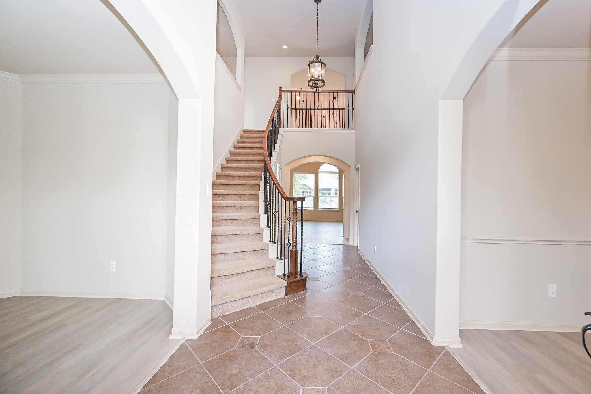 19 Sandwell Place Spring, TX 77389 - Photo 3 of 33 Grand foyer with formal dining room off to the right and versatile flex space off to the left
