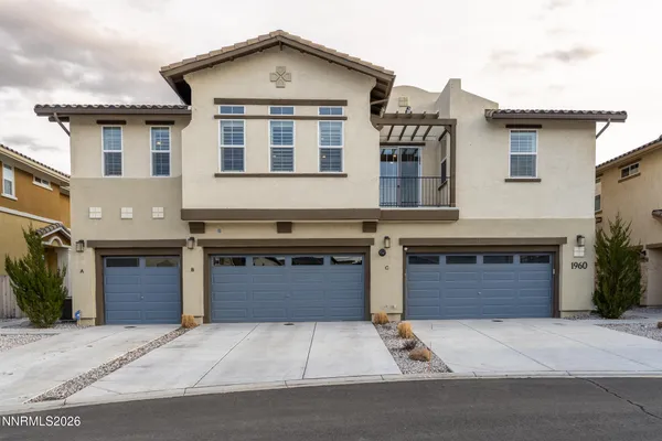a front view of a house with yard