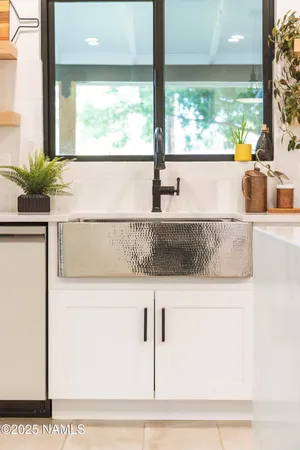 a bathroom with a bathtub and window