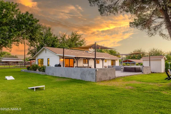a front view of a house with patio