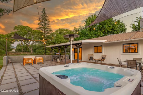 a patio with patio outdoor seating and yard