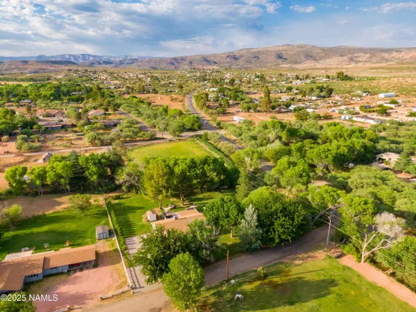 a view of a city with mountains in the background