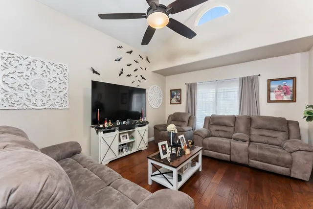 a kitchen with stainless steel appliances a refrigerator sink and cabinets