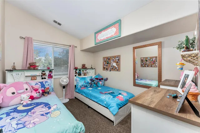 a en suite bathroom with a toilet sink and tub