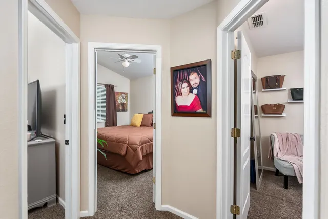 a bathroom with a shower a toilet and a sink