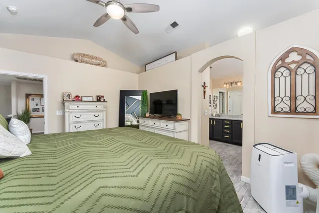 a area with furniture and a flat screen tv