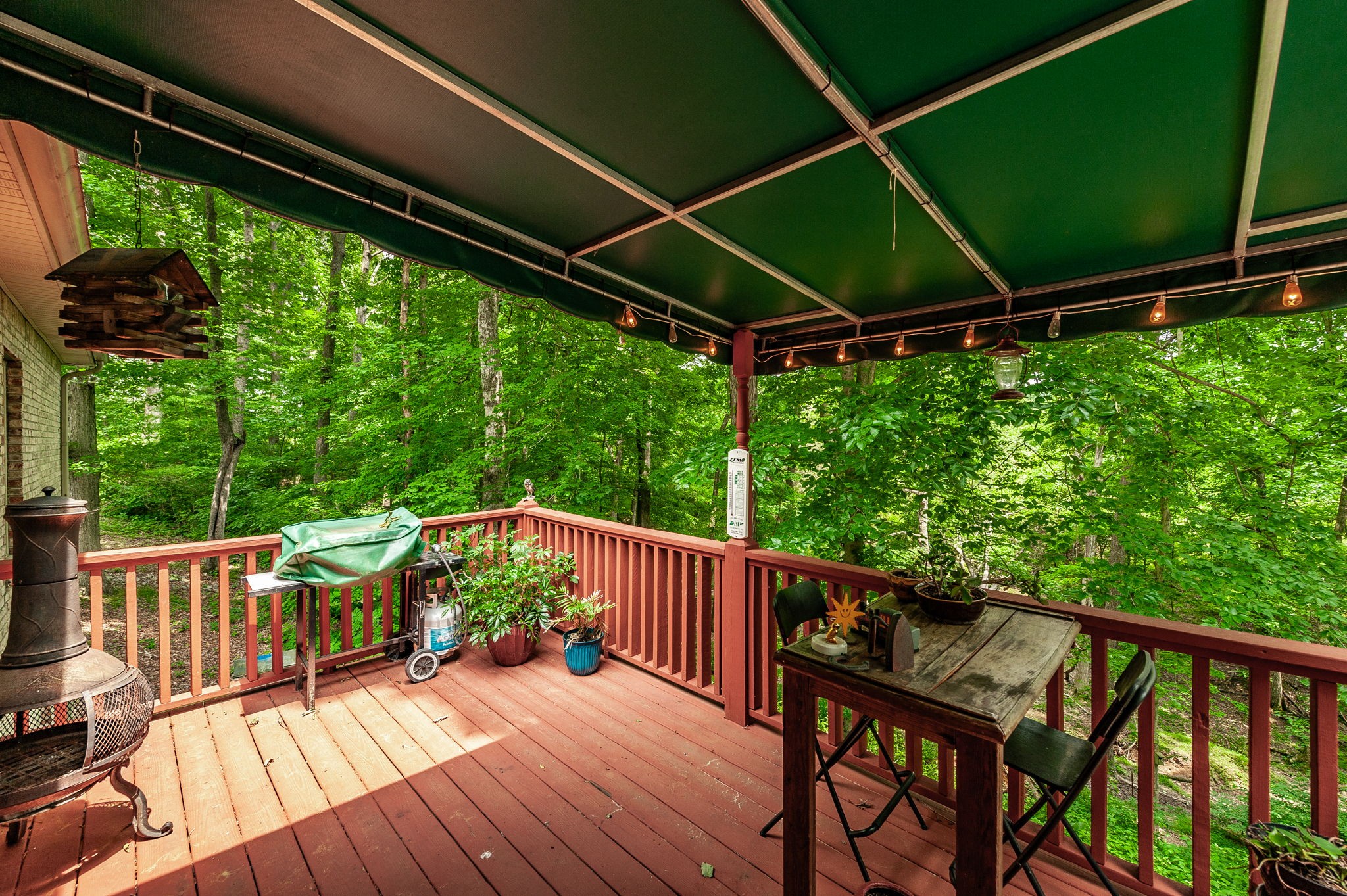 6513 North Mt Pleasant Road Greenbrier, TN 37073 - Photo 18 of 54 a view of a chairs and table in the balcony