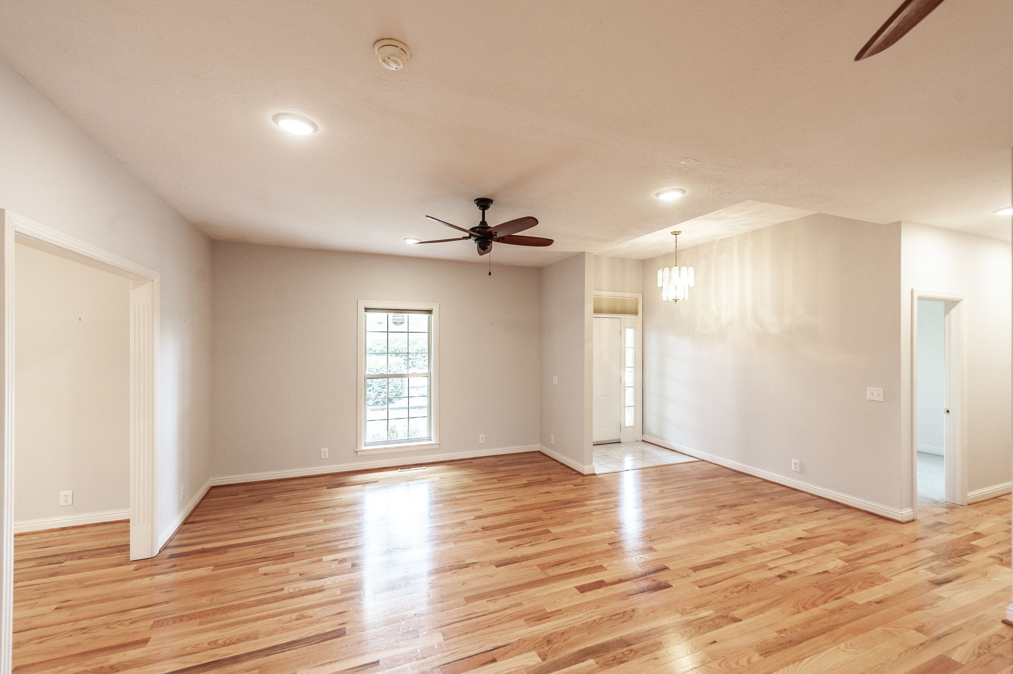 6513 North Mt Pleasant Road Greenbrier, TN 37073 - Photo 23 of 54 a view of an empty room with wooden floor and a window