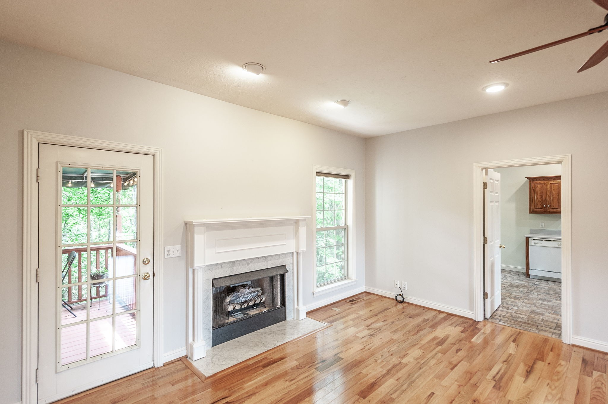 6513 North Mt Pleasant Road Greenbrier, TN 37073 - Photo 26 of 54 a view of an empty room with window and wooden floor