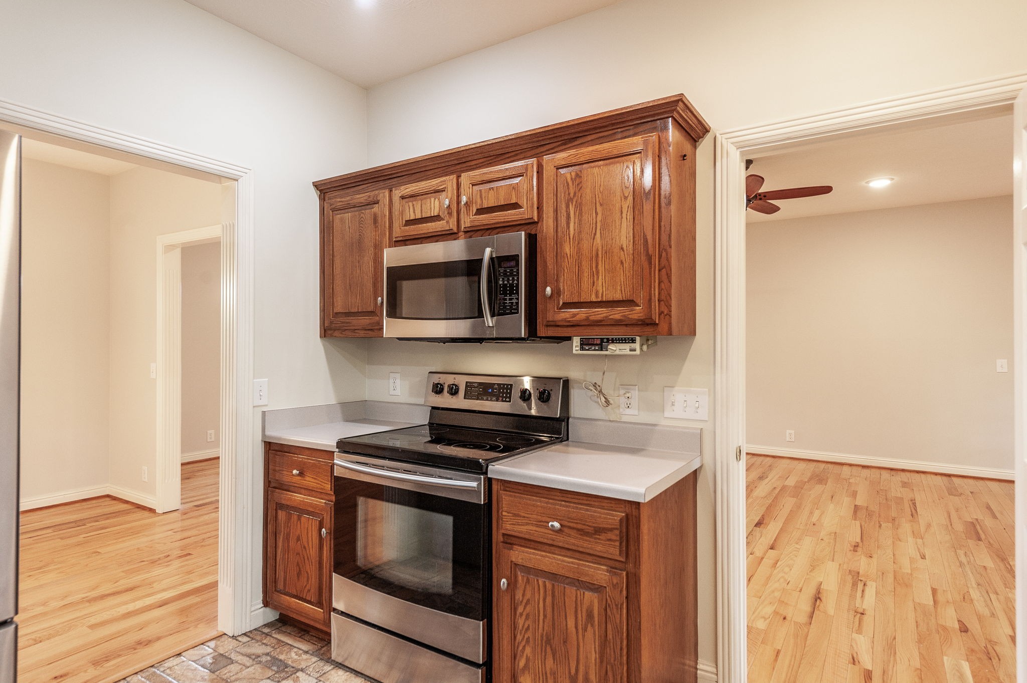6513 North Mt Pleasant Road Greenbrier, TN 37073 - Photo 33 of 54 a kitchen with stainless steel appliances a stove a microwave and a sink