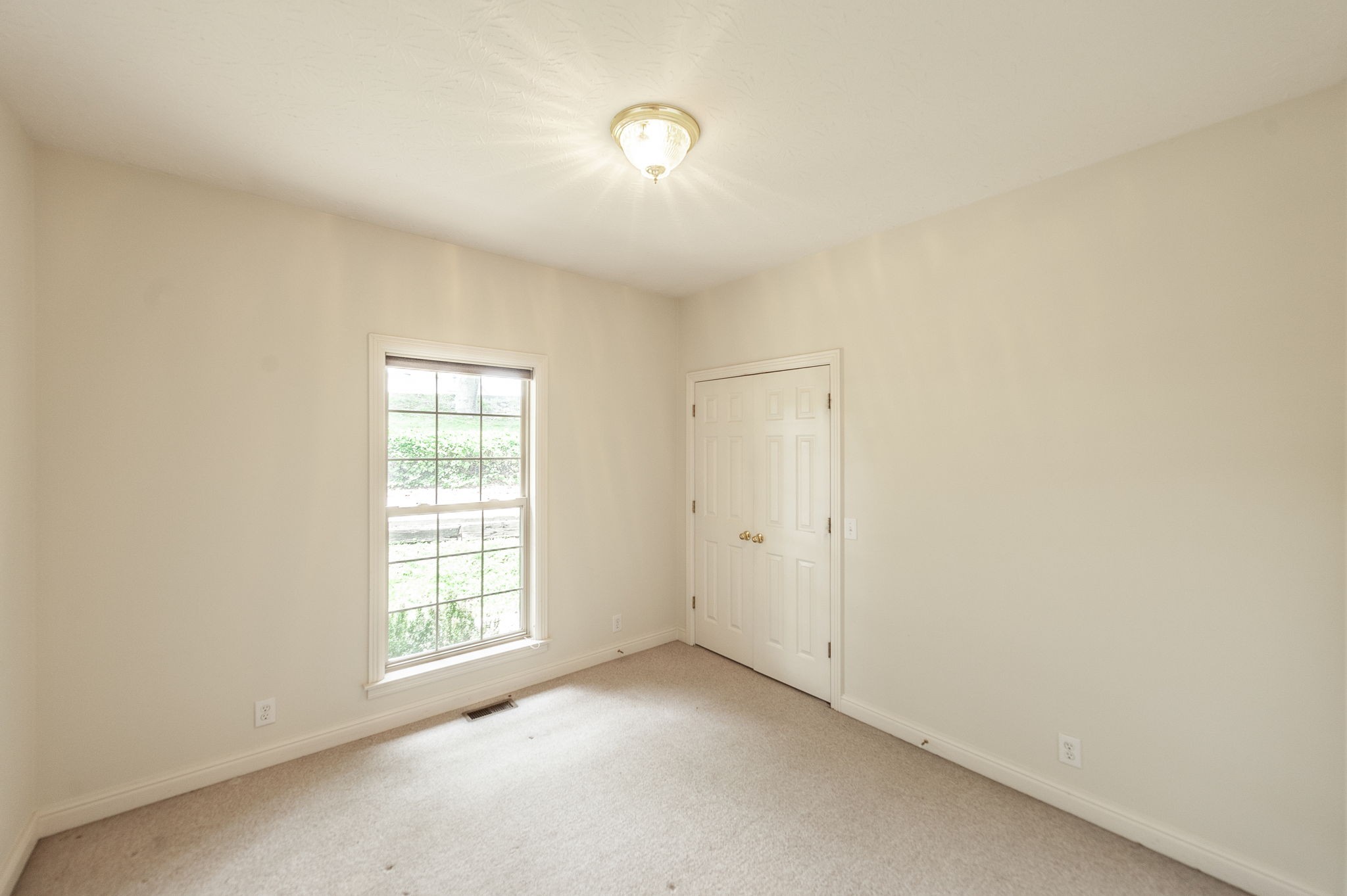 6513 North Mt Pleasant Road Greenbrier, TN 37073 - Photo 44 of 54 a view of an empty room with a window