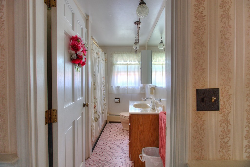 954 Chase Road Lunenburg, MA 01462 - Photo 17 of 27 a very nice looking room with a flowers and a window