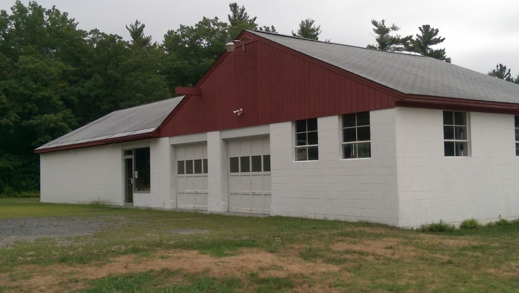 954 Chase Road Lunenburg, MA 01462 - Photo 25 of 27 a house that has a lot of windows in it
