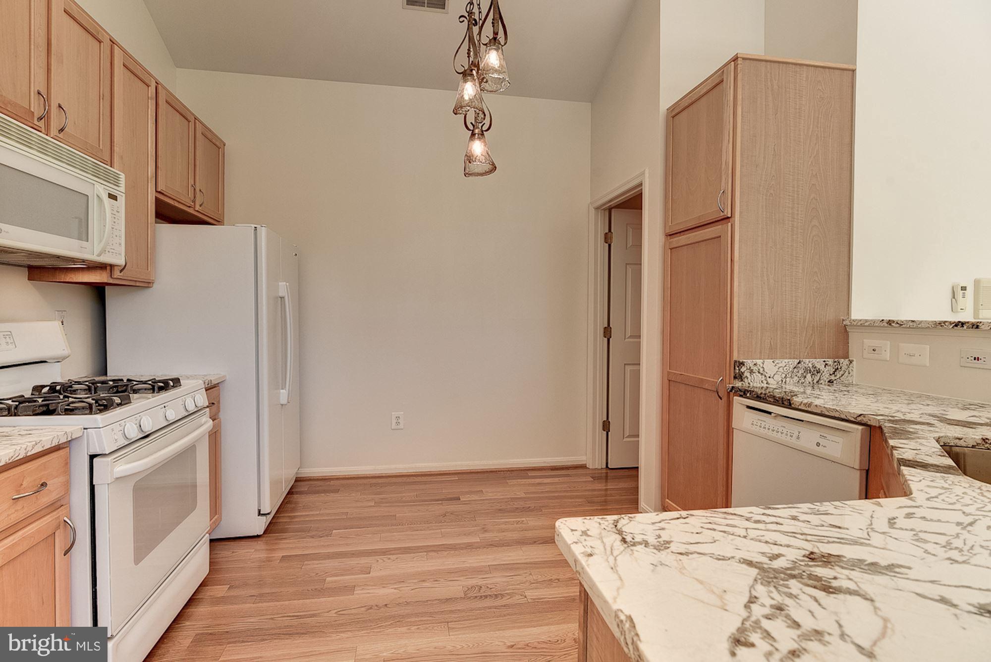 10706 Symphony Way, Unit 208 Columbia, MD 21044 - Photo 12 of 49 Kitchen