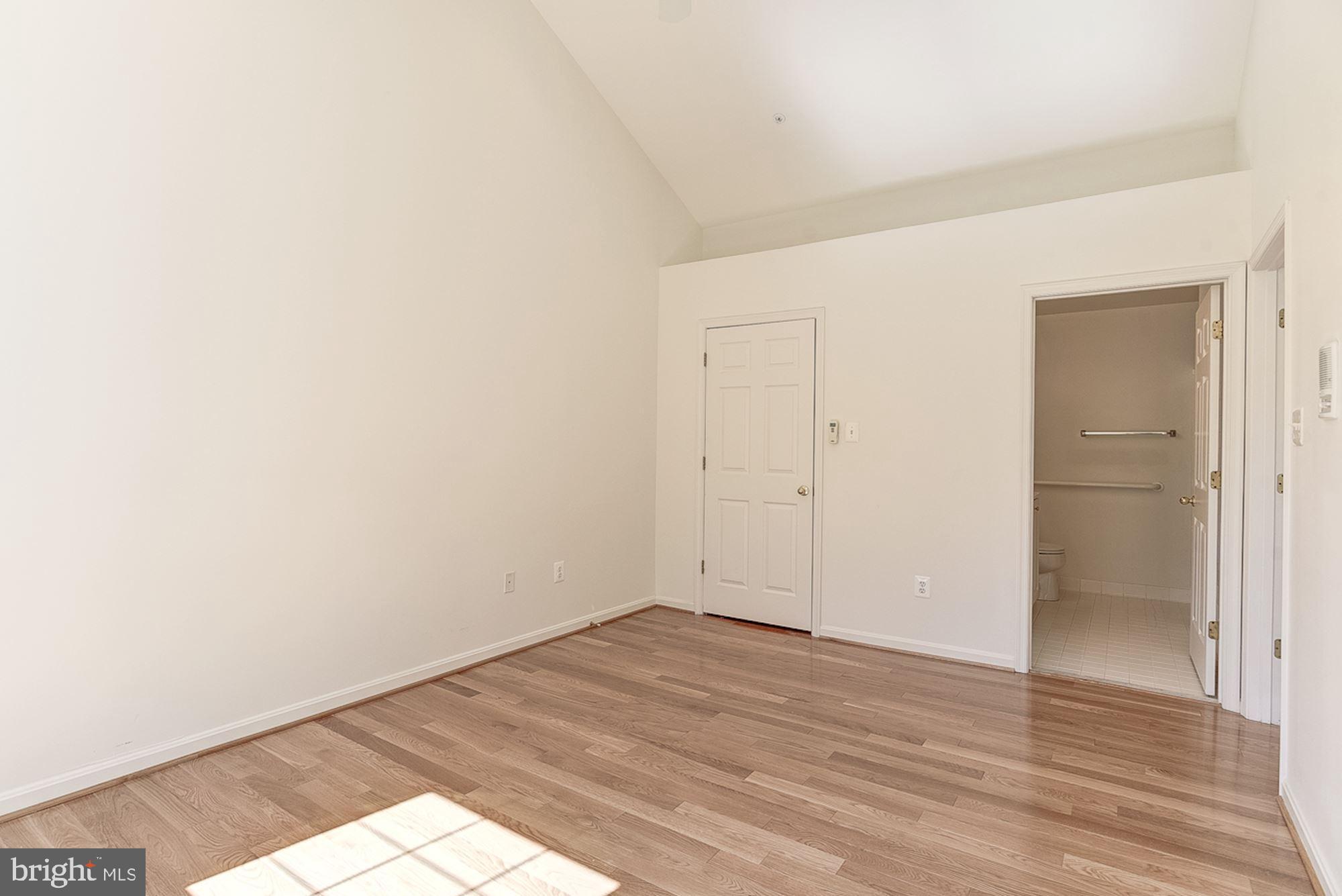 10706 Symphony Way, Unit 208 Columbia, MD 21044 - Photo 25 of 49 Primary Bedroom Suite