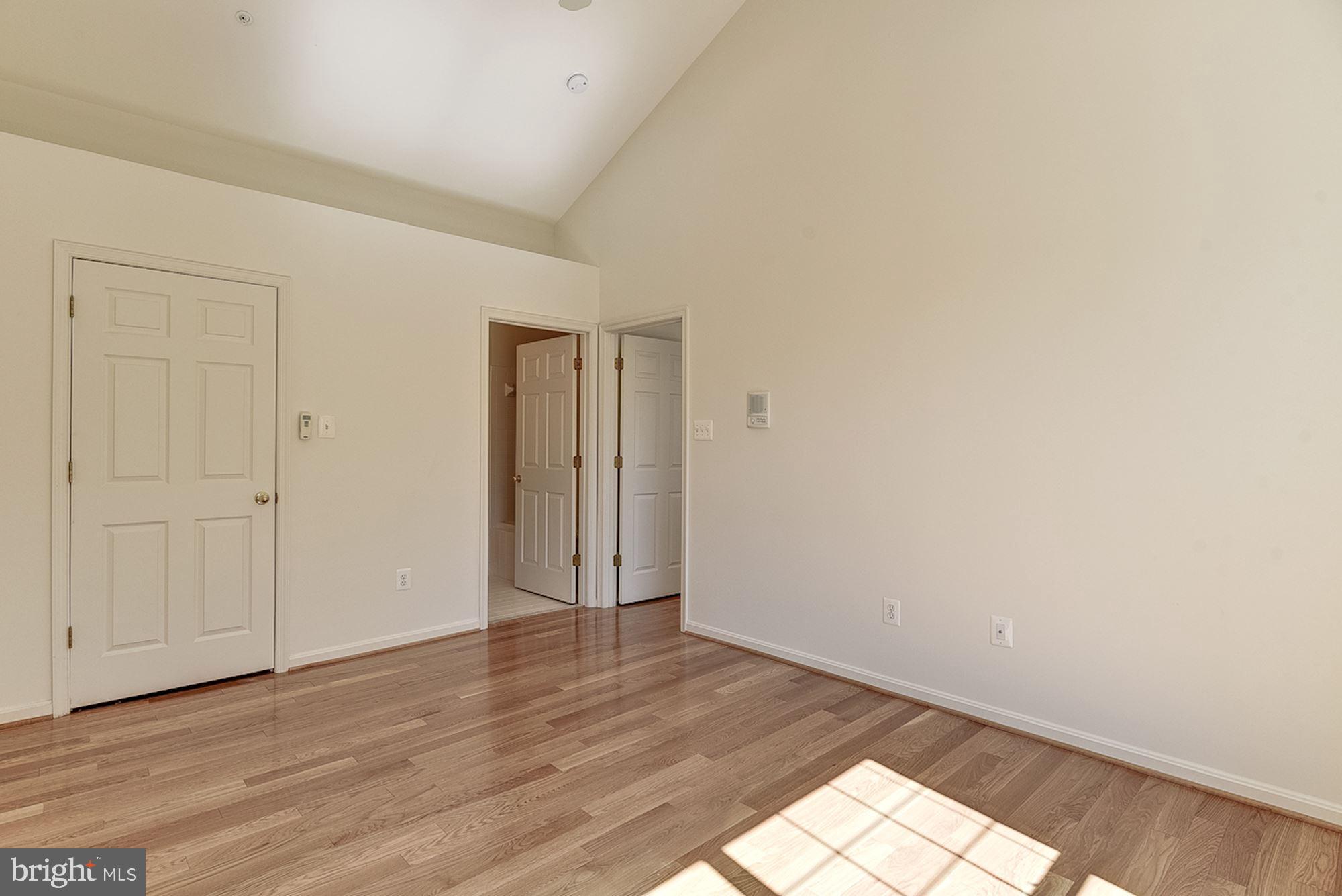 10706 Symphony Way, Unit 208 Columbia, MD 21044 - Photo 26 of 49 Primary Bedroom Suite