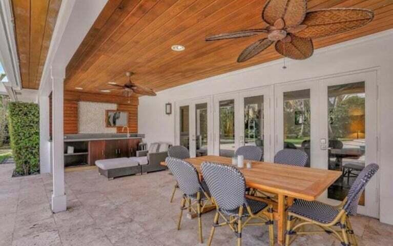 2100 Spanish River Road Boca Raton, FL 33432 - Photo 14 of 38 a outdoor space with patio the couches and a potted plant