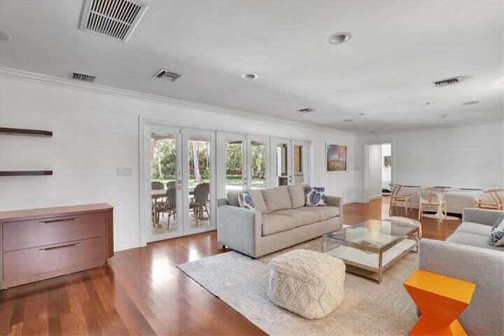 2100 Spanish River Road Boca Raton, FL 33432 - Photo 21 of 38 a living room with furniture and wooden floor