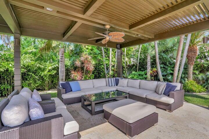 2100 Spanish River Road Boca Raton, FL 33432 - Photo 3 of 38 a outdoor living space with furniture and garden view