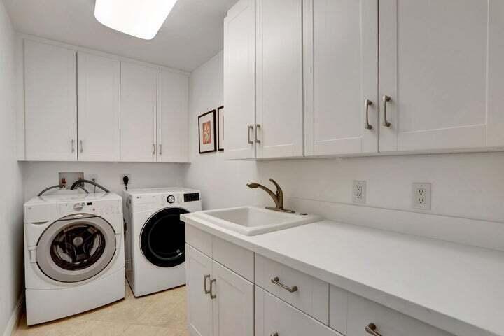 2100 Spanish River Road Boca Raton, FL 33432 - Photo 35 of 38 a utility room with sink dryer and washer