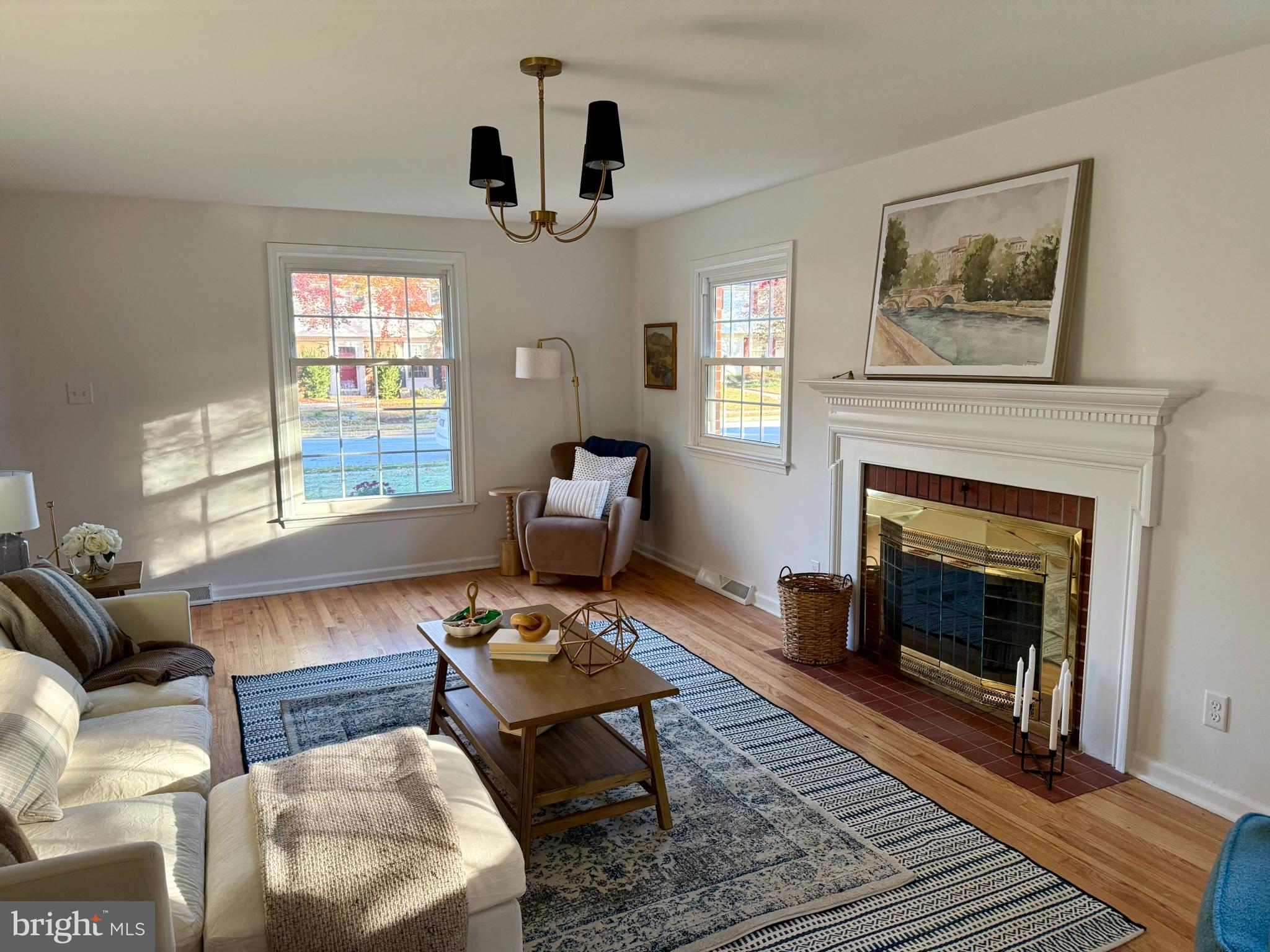 530 Woodsedge Road Dover, DE 19904 - Photo 12 of 52 a living room with furniture a fireplace and window