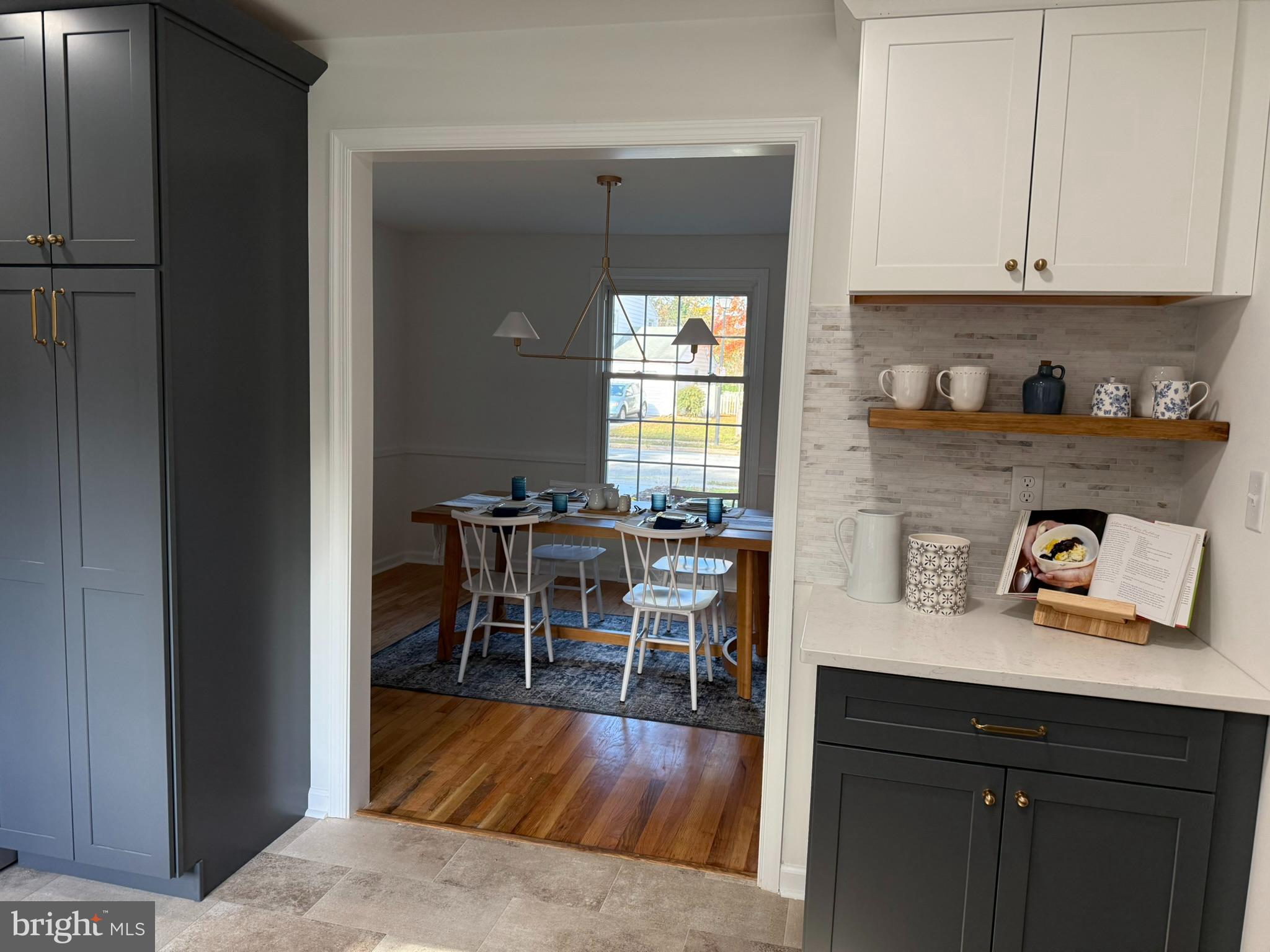 530 Woodsedge Road Dover, DE 19904 - Photo 25 of 52 a view of a dining room with furniture and wooden floor