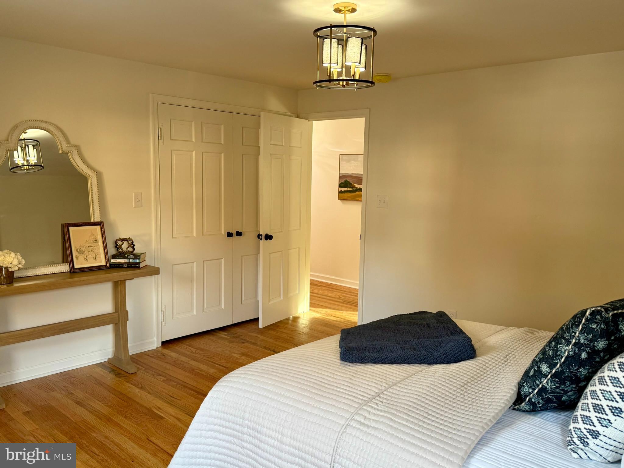 530 Woodsedge Road Dover, DE 19904 - Photo 34 of 52 a bedroom with a bed and a table