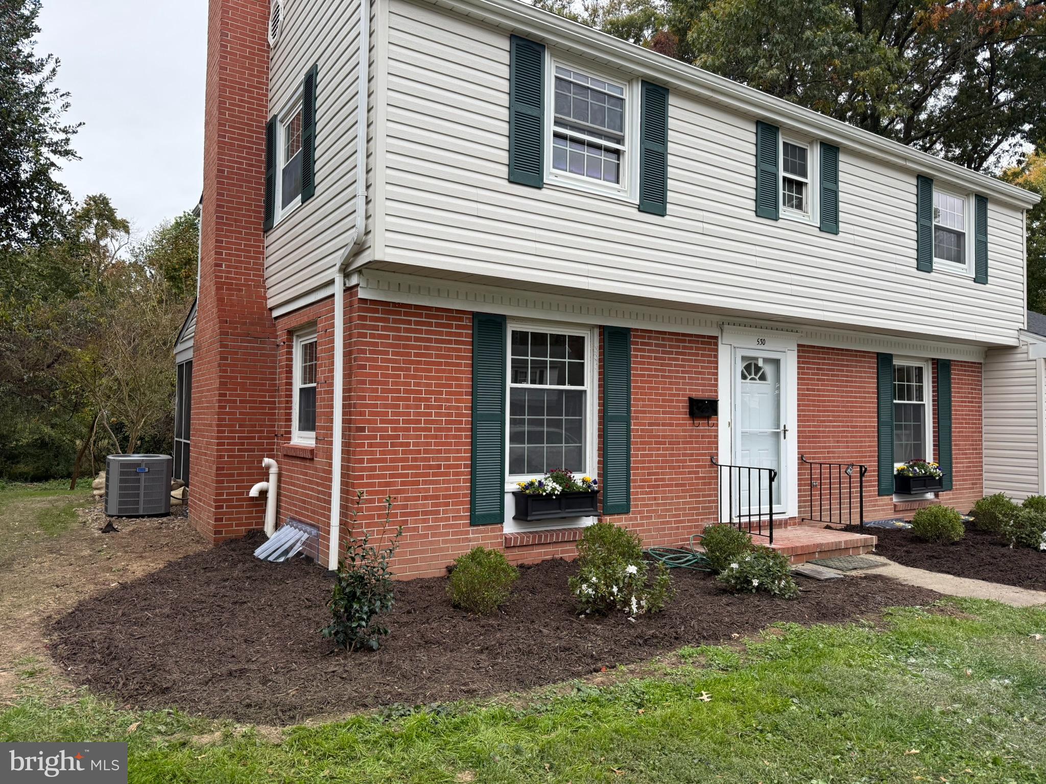 530 Woodsedge Road Dover, DE 19904 - Photo 4 of 52 a front view of a house with a yard