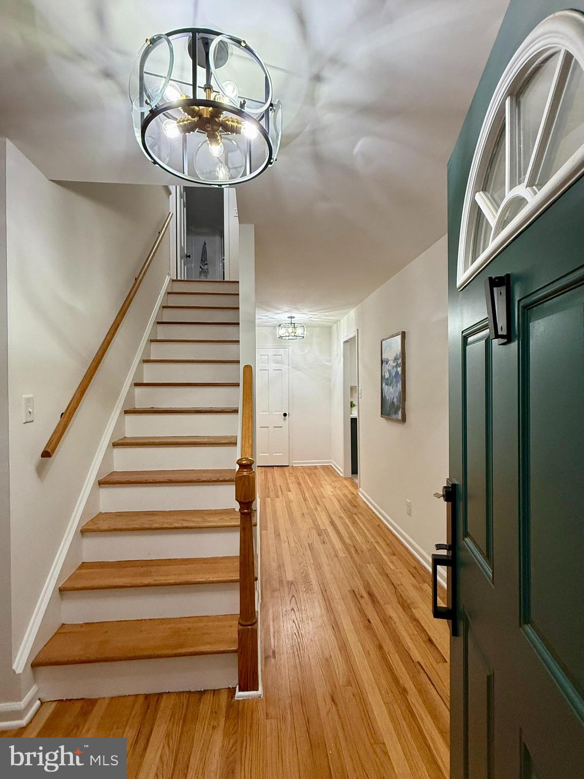 530 Woodsedge Road Dover, DE 19904 - Photo 6 of 52 a view of entryway and hall with wooden floor