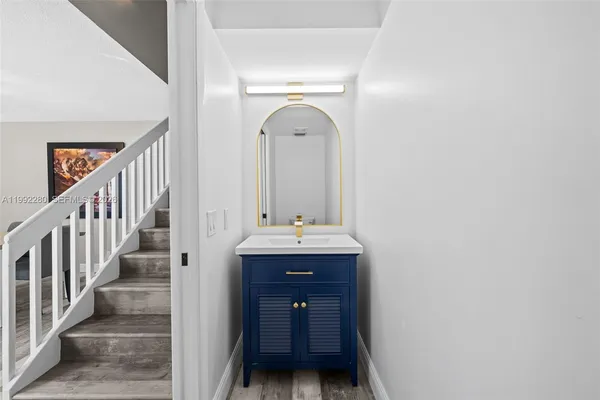 a view of entryway with wooden door