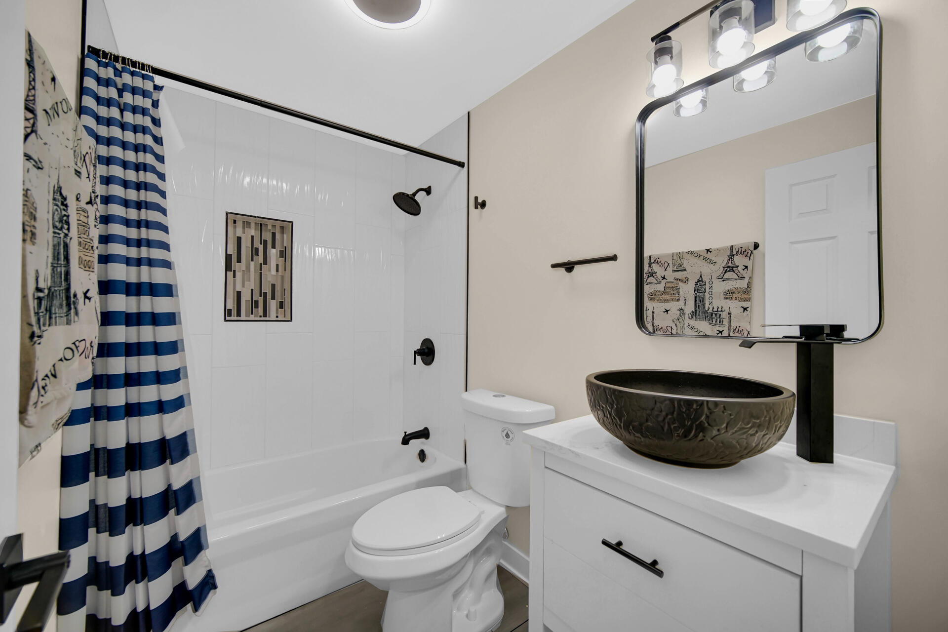 2232 Roosevelt Place Gary, IN 46404 - Photo 13 of 21 a bathroom with a sink toilet a mirror and shower