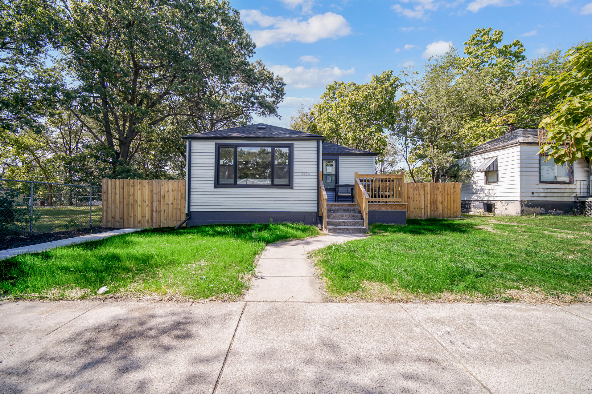 2232 Roosevelt Place Gary, IN 46404 - Photo 21 of 21 a front view of a house with a garden