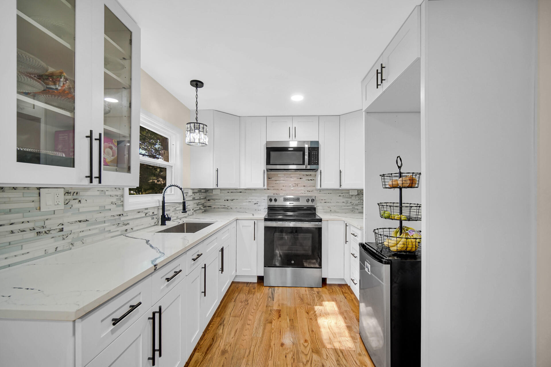 2232 Roosevelt Place Gary, IN 46404 - Photo 5 of 21 a kitchen with a sink stove and refrigerator