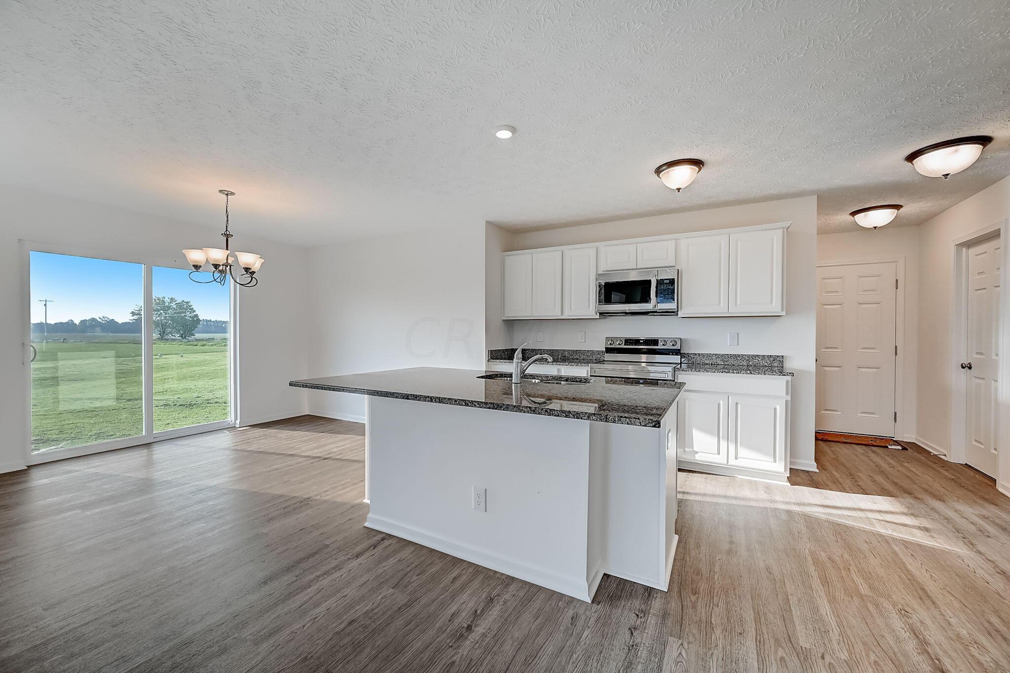 1158 Burnt Pond Road Ostrander, OH 43061 - Photo 7 of 33 Large Kitchen with Eating Area
