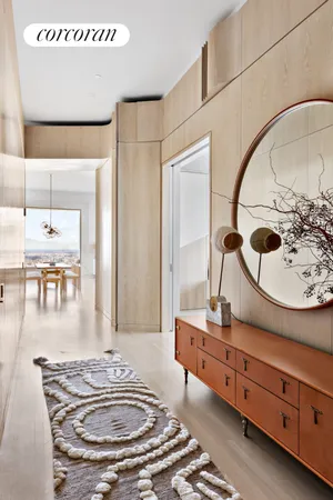a kitchen that has a lot of cabinets in it and appliances