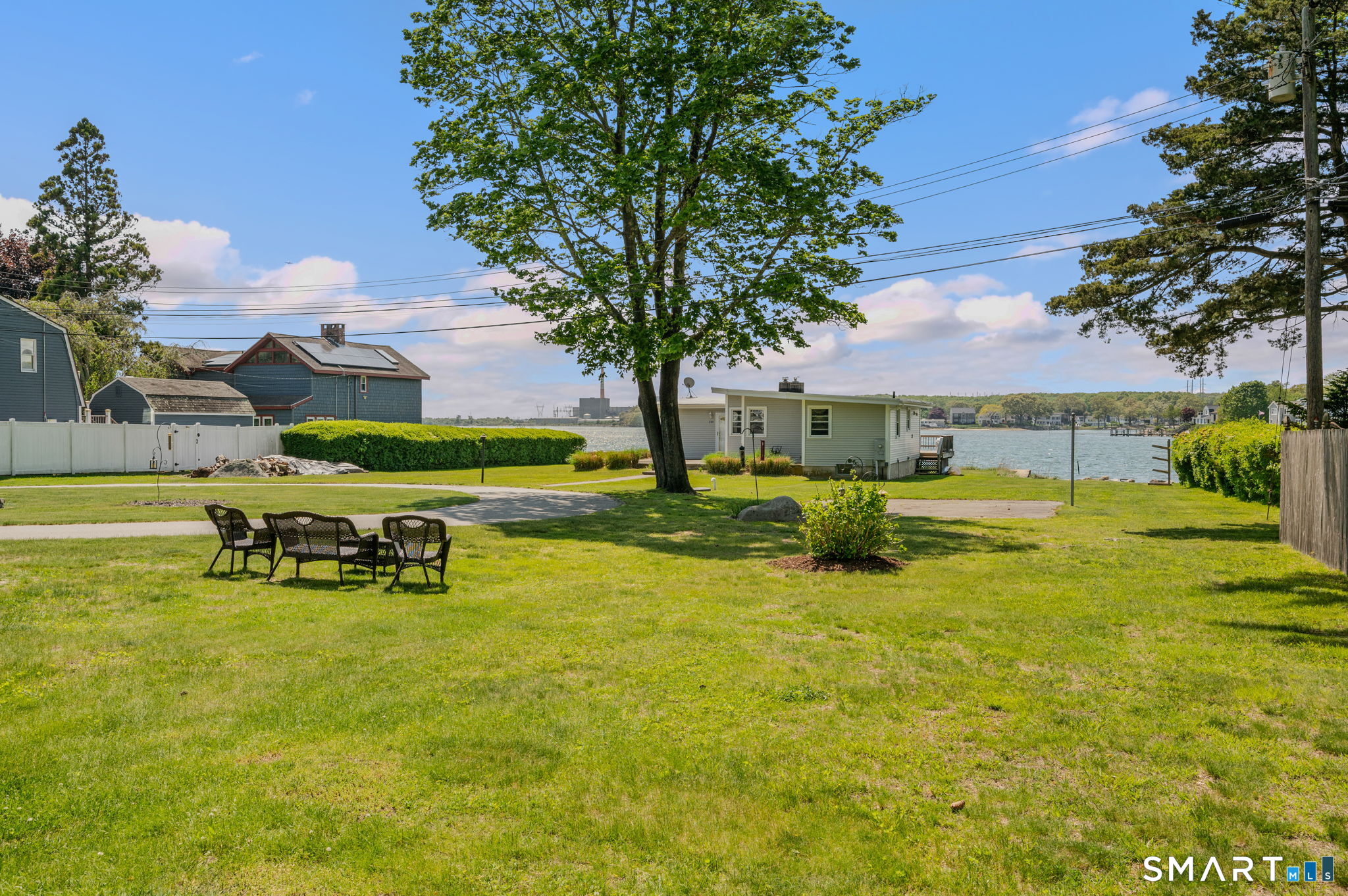 212 R Shore Road Waterford, CT 06385 - Photo 4 of 28 a view of yard with swimming pool and green space