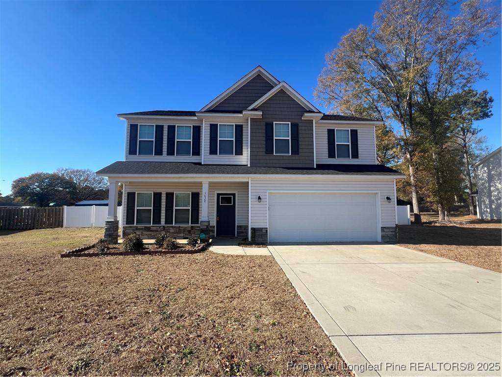 1628 Strickland Bridge Road Fayetteville, NC 28304 - Photo 1 of 20 a front view of a house with a yard