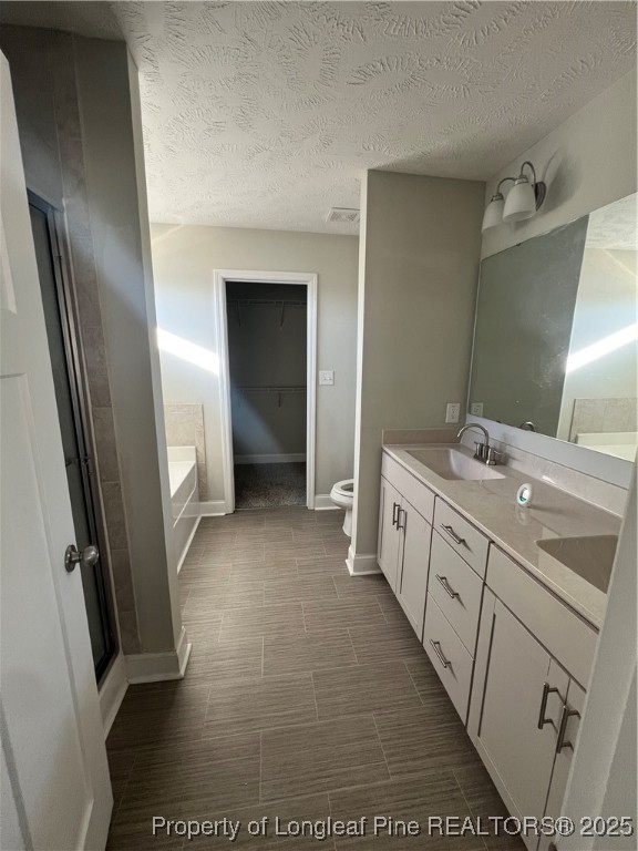 1628 Strickland Bridge Road Fayetteville, NC 28304 - Photo 13 of 20 a bathroom with double vanity and mirrors