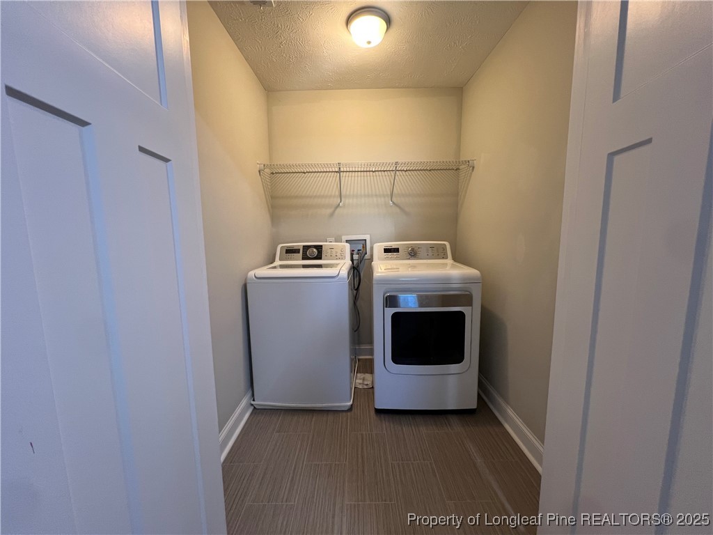 1628 Strickland Bridge Road Fayetteville, NC 28304 - Photo 19 of 20 a utility room with dryer and washer