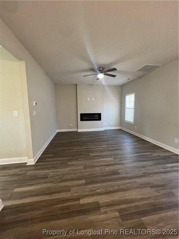 1628 Strickland Bridge Road Fayetteville, NC 28304 - Photo 8 of 20 a view of a livingroom with wooden floor