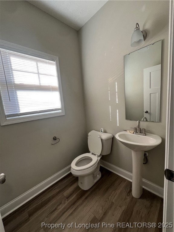 1628 Strickland Bridge Road Fayetteville, NC 28304 - Photo 10 of 20 a bathroom with a sink toilet and a mirror