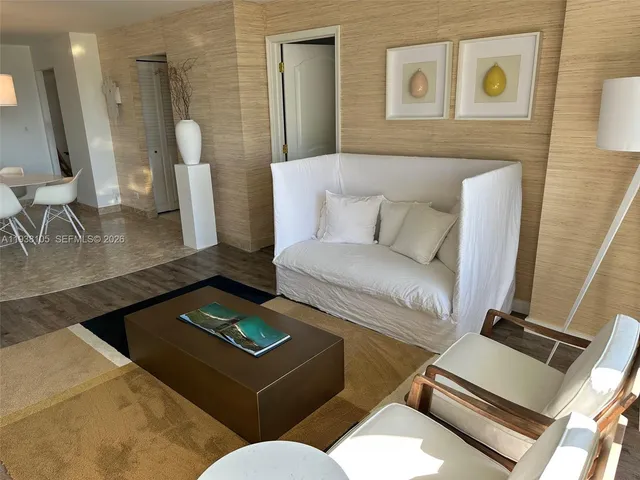 a view of a balcony with chairs