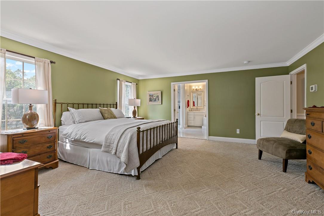 4 Sonoma Road Cortlandt Manor, NY 10567 - Photo 15 of 31 a bedroom with a bed and furniture
