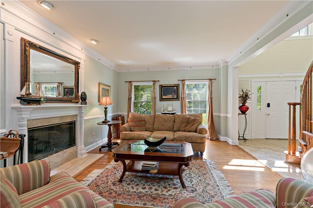 4 Sonoma Road Cortlandt Manor, NY 10567 - Photo 4 of 31 a living room with furniture and a fireplace